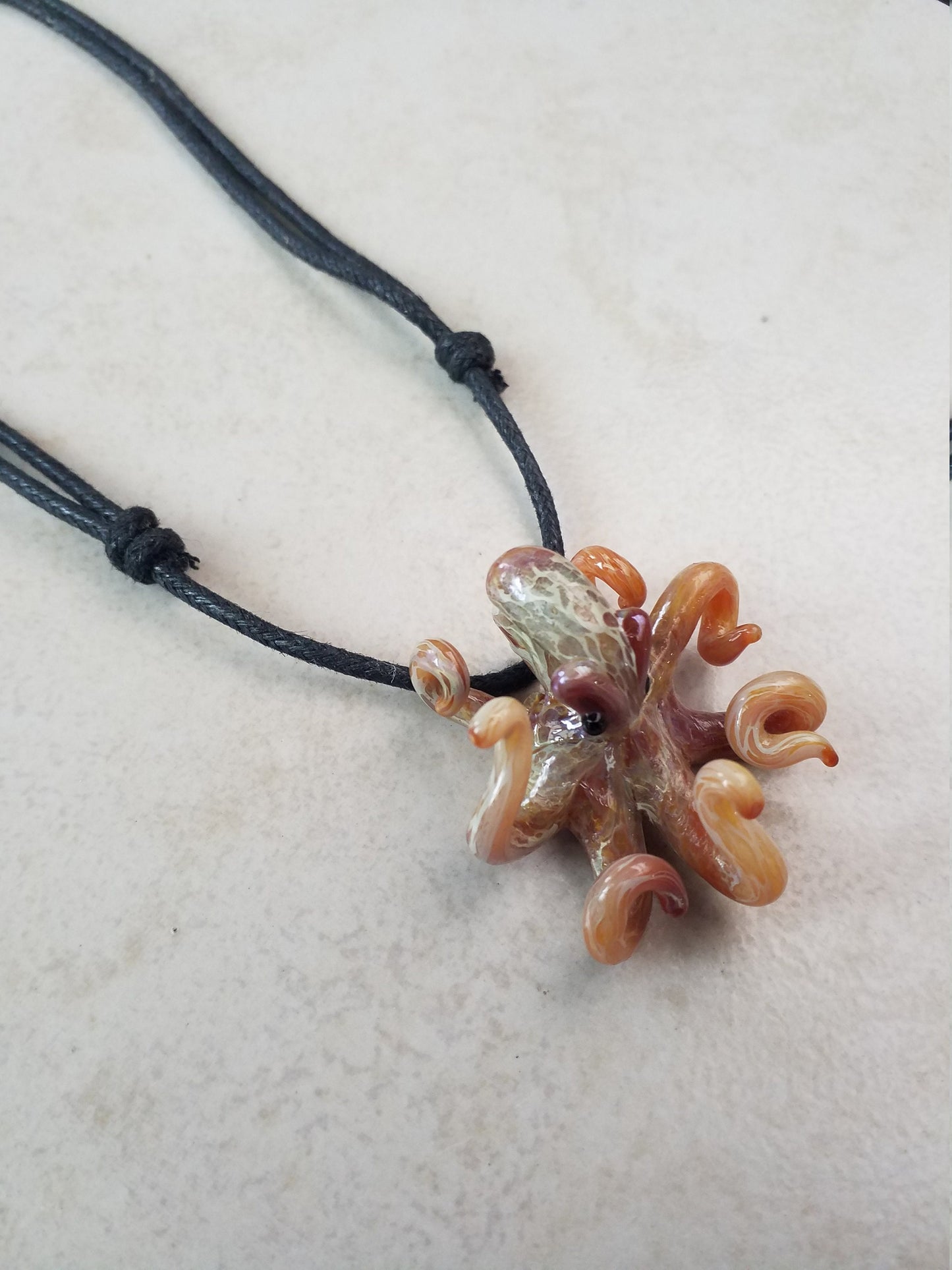 Pacific Octopus Pendant Necklace with multiple colors of Carmel and Brown a Great Gift Idea for Him or Her