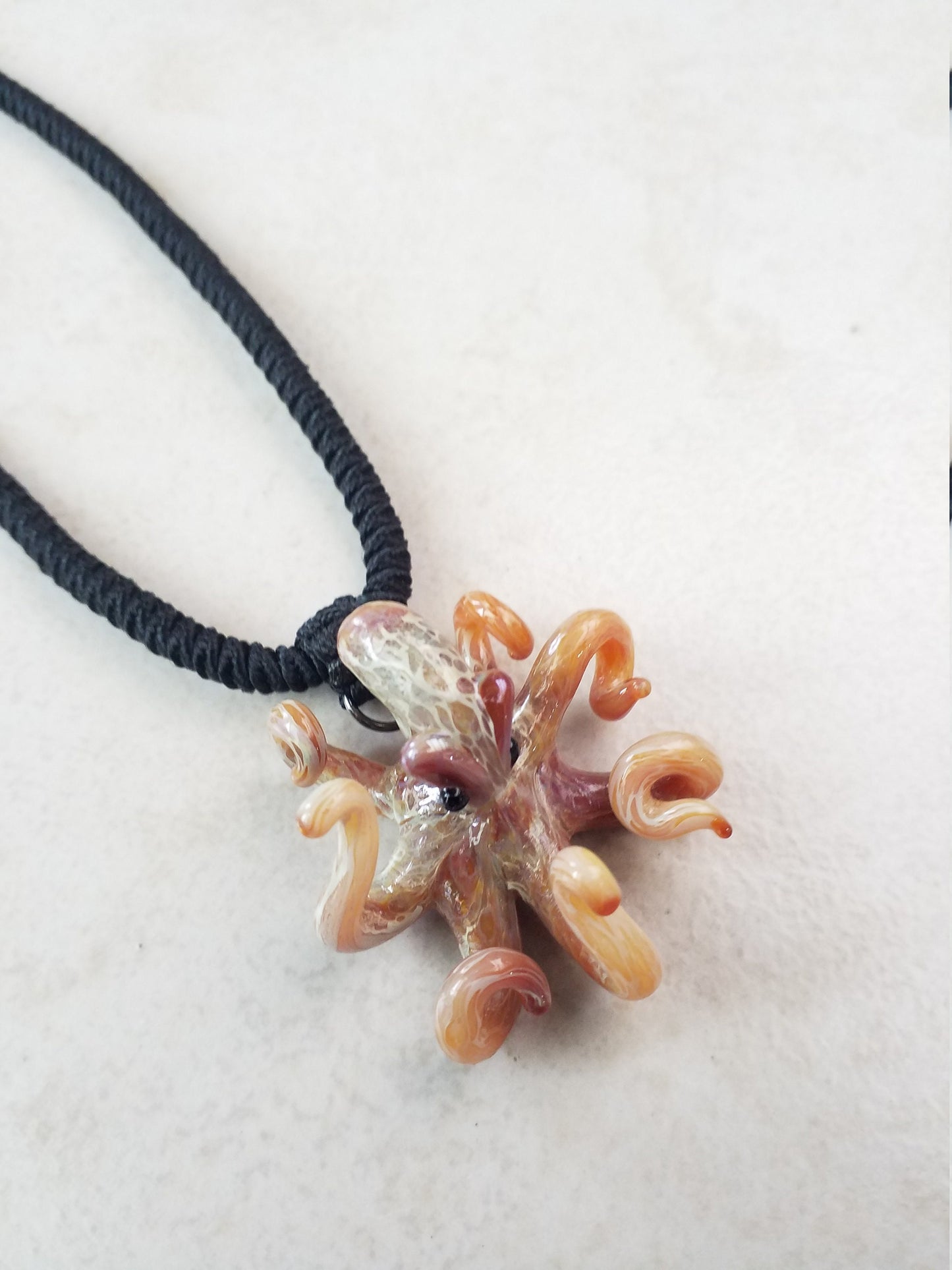 Pacific Octopus Pendant Necklace with multiple colors of Carmel and Brown a Great Gift Idea for Him or Her