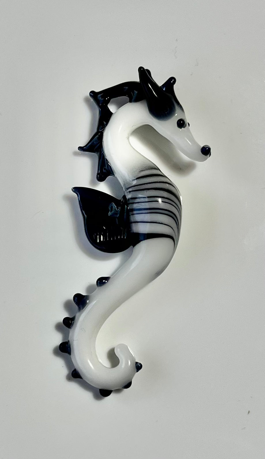 Sea Horse Splendor: Hand-Blown Black and White Glass Pendant - GLASSnFIRE