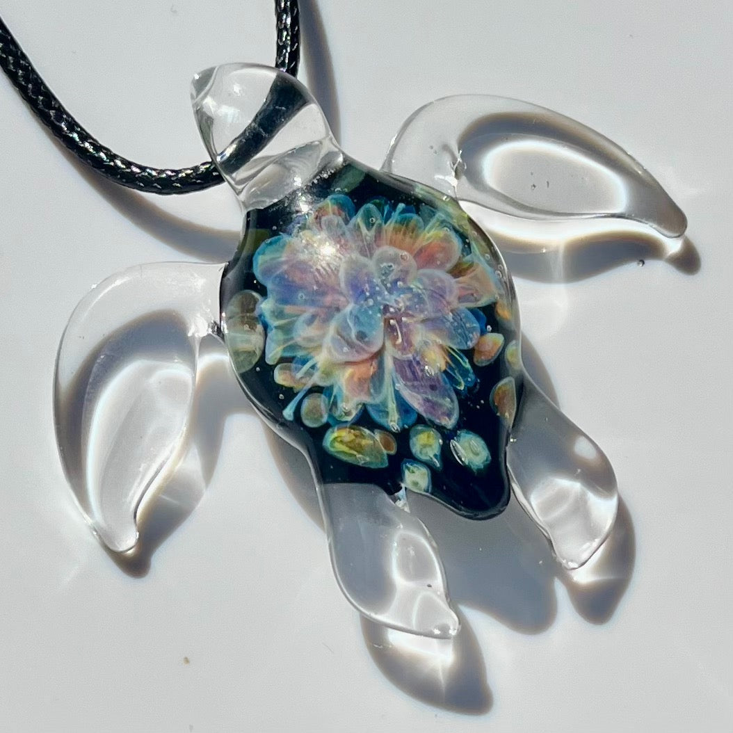 Clear Glass Sea Turtle Pendant with Purple and Amber Floral Shell Design