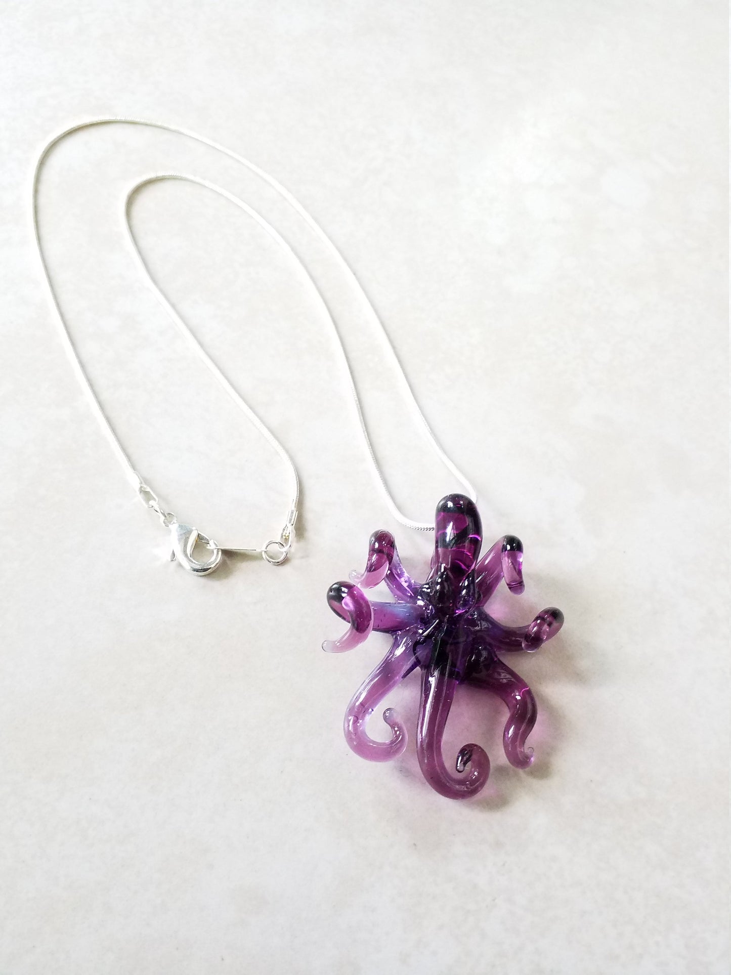 Transparent Purple Octopus Glass Pendant with Gracefully Curled Tentacles – Handcrafted Ocean-Inspired Jewelry