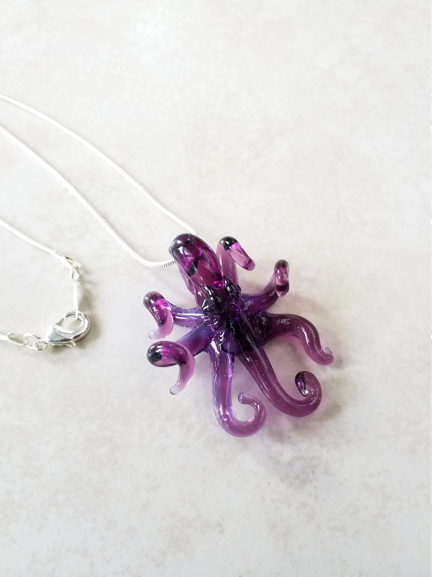 Transparent Purple Octopus Glass Pendant with Gracefully Curled Tentacles – Handcrafted Ocean-Inspired Jewelry