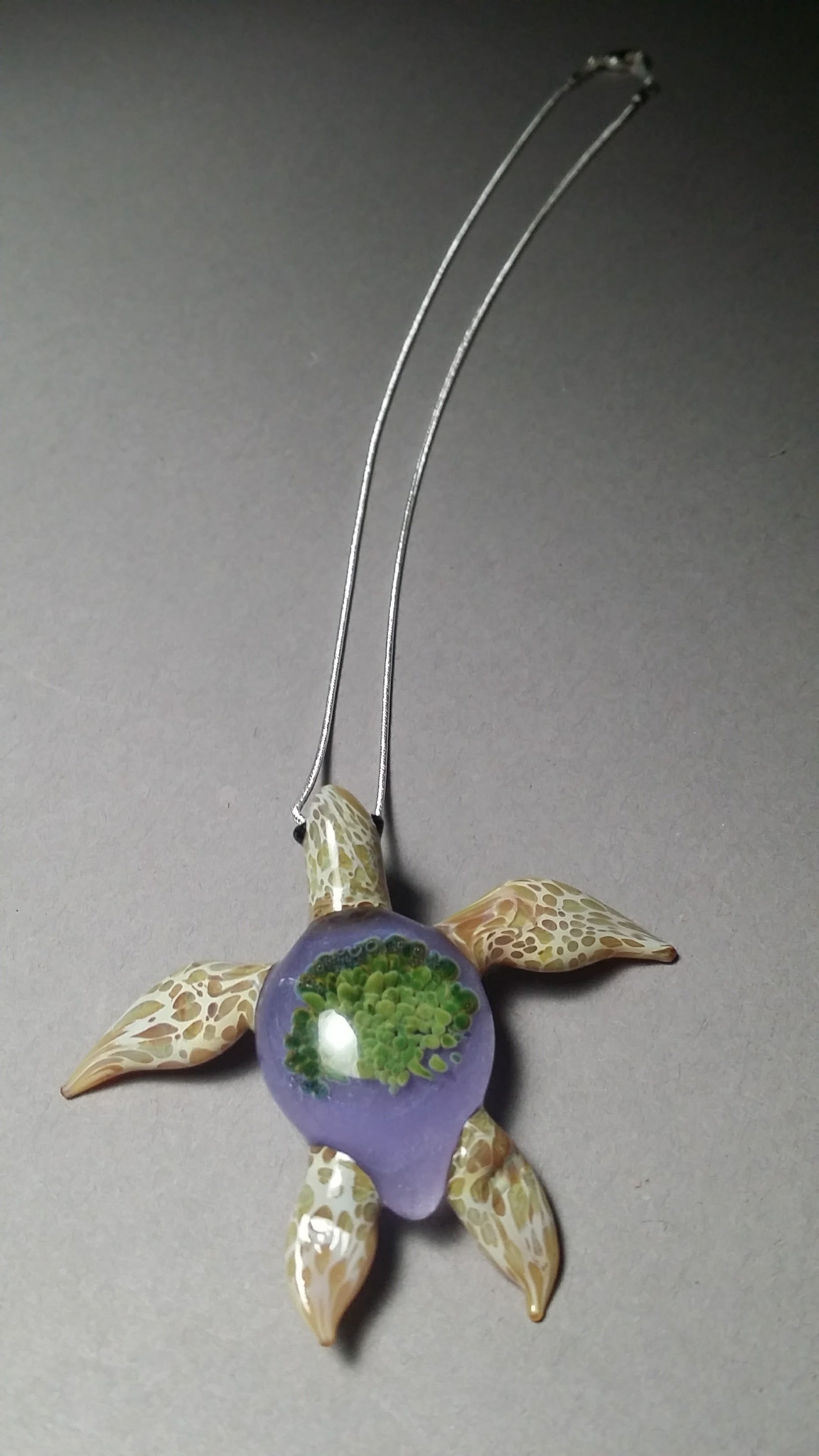 Special edition periwinkle background with green anemones in a beach blonde glass sea turtle pendant - GLASSnFIRE