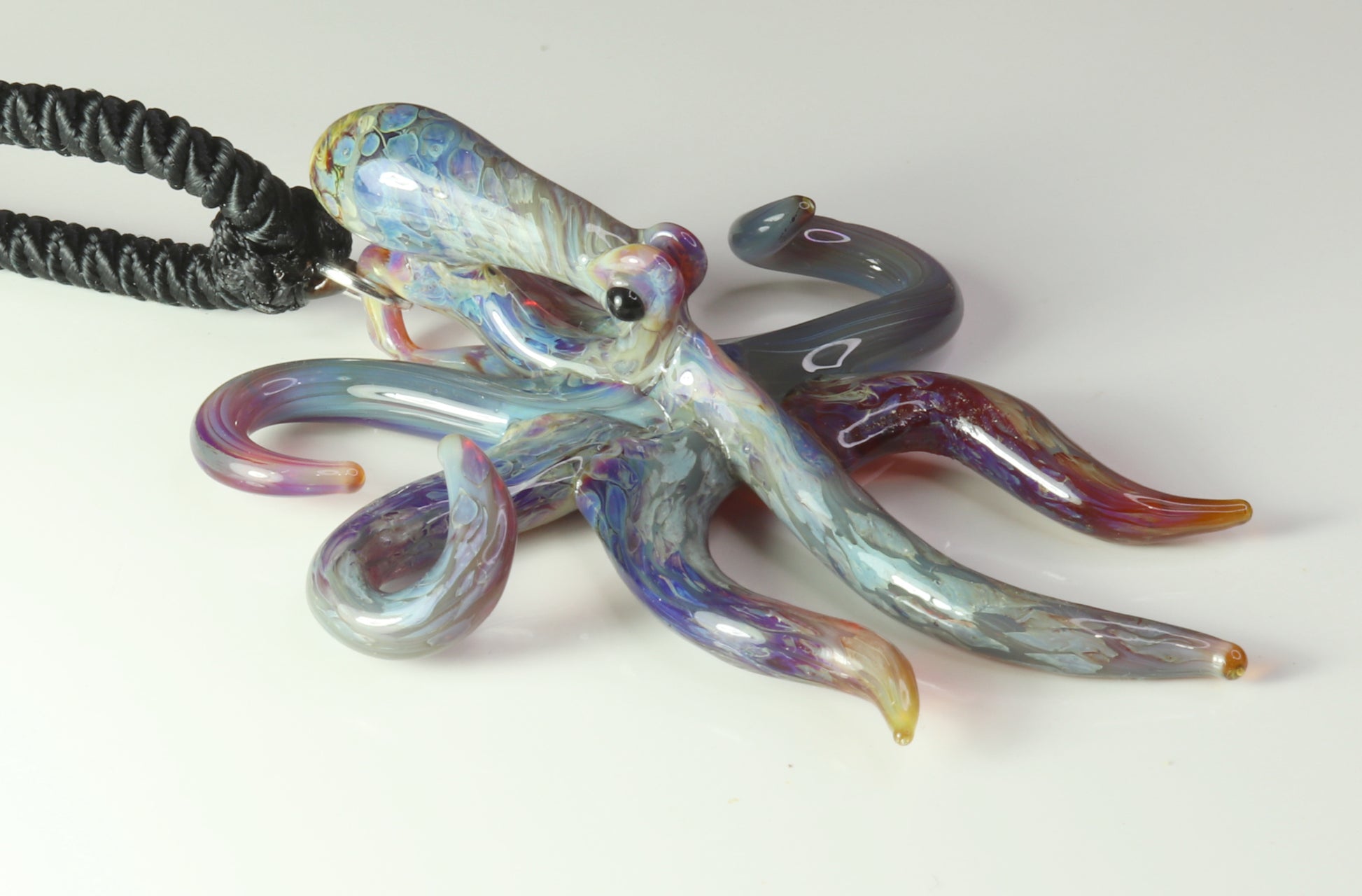 Purple glass spreading octopus pendant - GLASSnFIRE