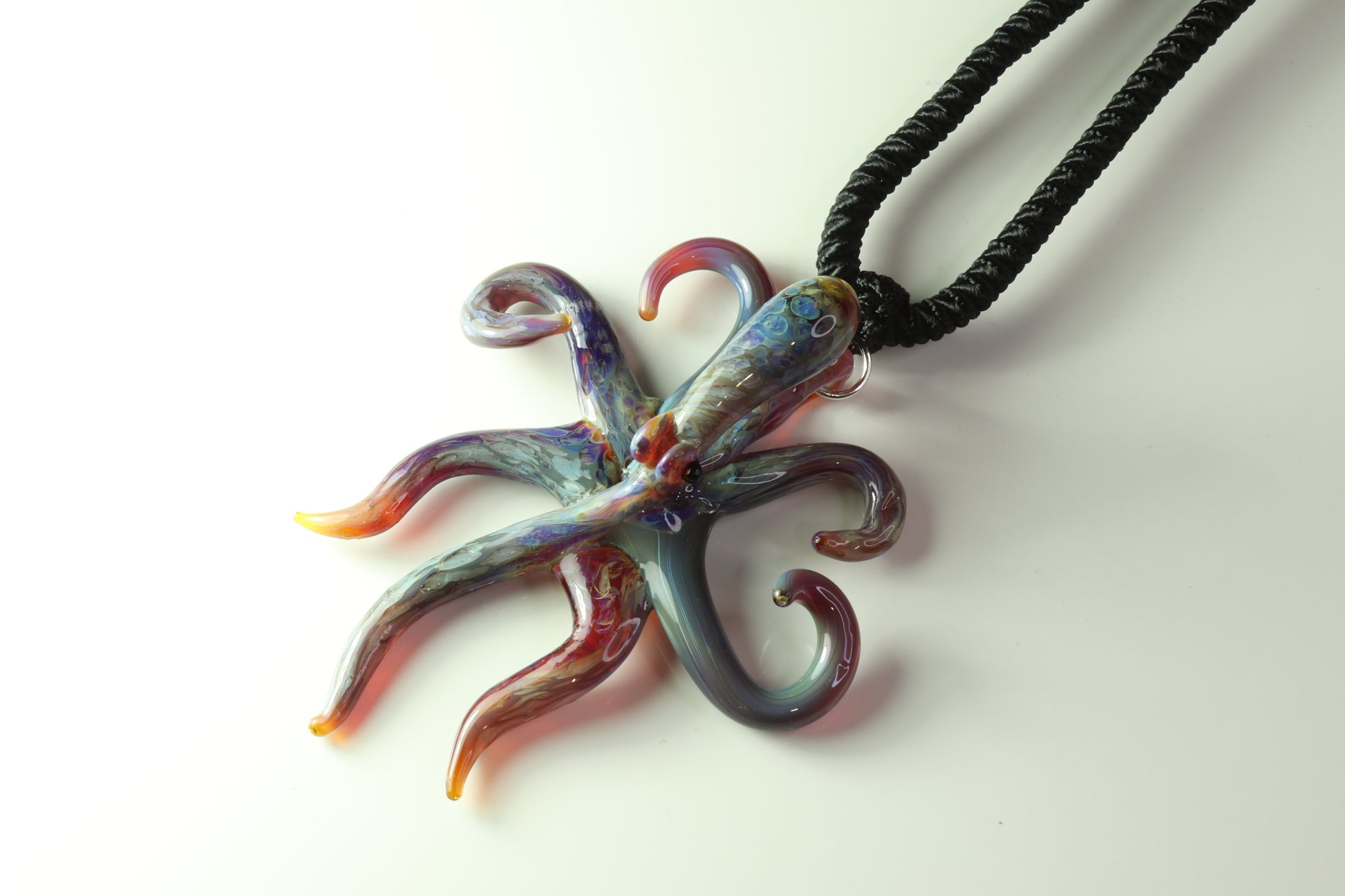 Purple glass spreading octopus pendant - GLASSnFIRE