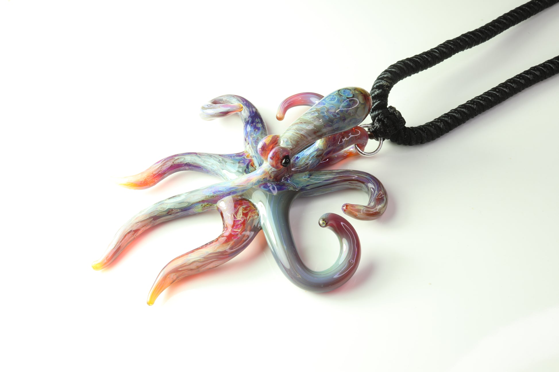 Purple glass spreading octopus pendant - GLASSnFIRE