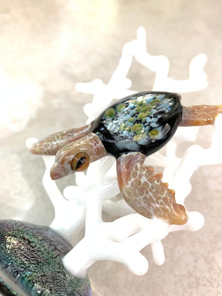 Serene glass loggerhead sea turtle sculpture