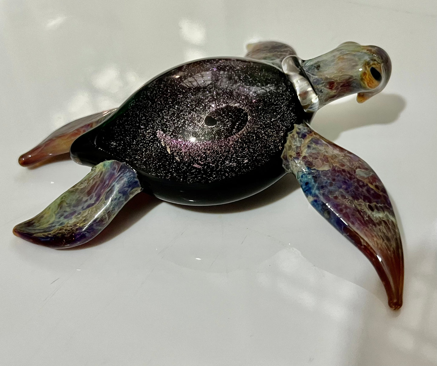 Galaxy Vortex inside this purple glass sea turtle