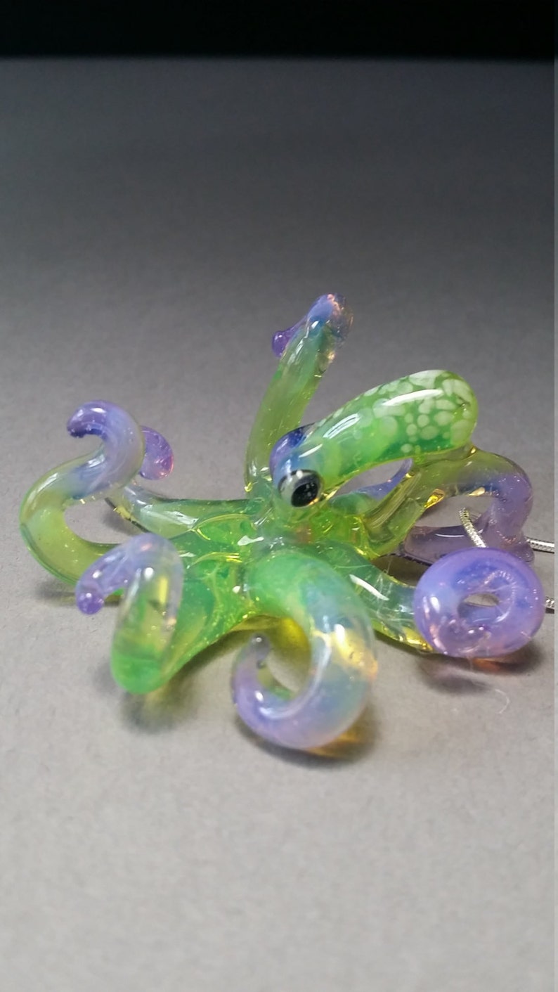 Green and purple handmade glass octopus pendant